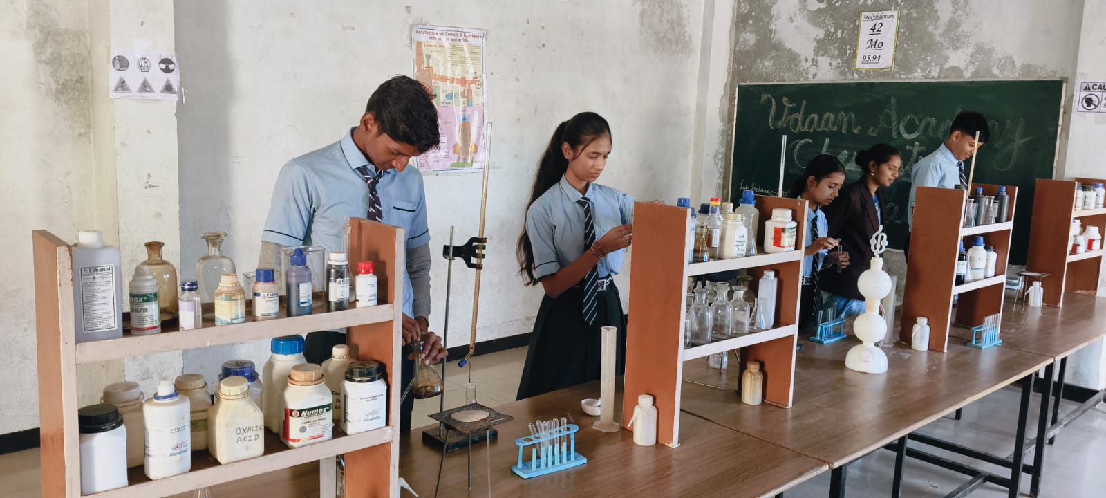 Biology laboratory at Udaan Academy equipped with microscopes, specimen collections, and research facilities for PCB stream students